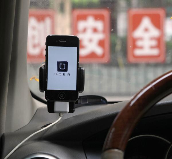 外媒揭秘中国司机优步骗补:买部改装手机能永