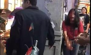 广西玉林一女子逛街踩到男子的脚，对方尾随持刀砍伤