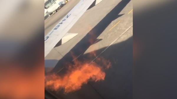 俄波音客机引擎起火，乘客跳机被喊回
