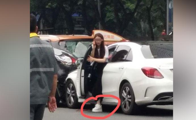 广州一轿车闯红灯撞人群，女司机穿松糕鞋