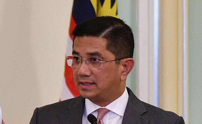 马来西亚经济事务部长否认是性爱视频主角，谴责是政治阴谋