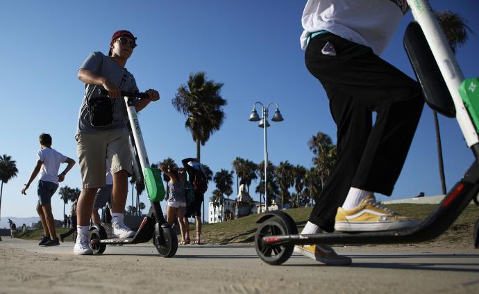 全球城市观察 | 先上路后治理，来自共享电动滑板车的挑战