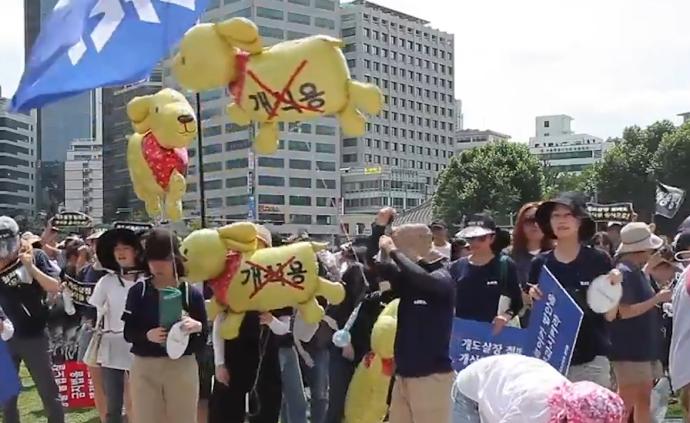 首尔百人集会呼吁停食狗肉，关闭屠宰场