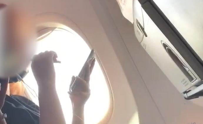 一乘客疑似在飞机上抽电子烟，上海航空：正协同警方调查处置