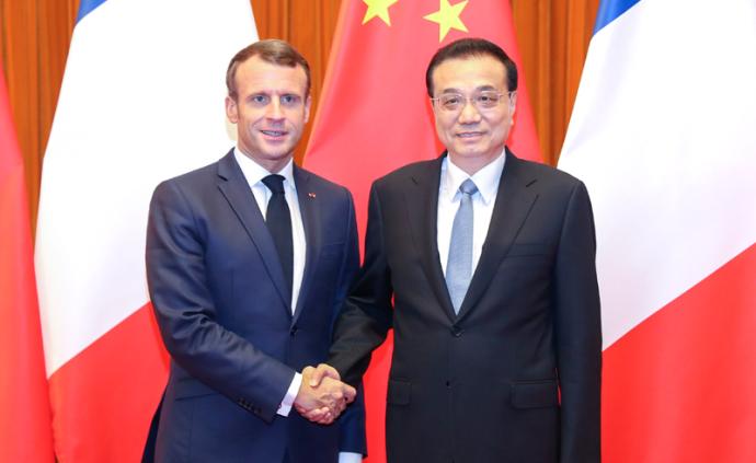 李克强会见法国总统马克龙：中方愿履行应对气候变化国际承诺