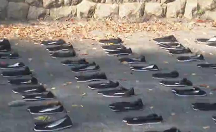 东京塔下摆6830双黑布鞋，中日共同悼念二战被掳中国劳工