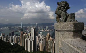 彭博社：香港房地产市场或触顶，开发商增持现金准备买地