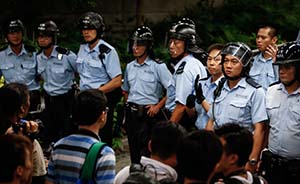 香港“占中”发生后多家网站遭攻击，警方拘捕11名嫌犯