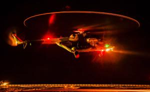 新疆军区陆航旅多型武装直升机进行跨昼夜高难度飞行训练