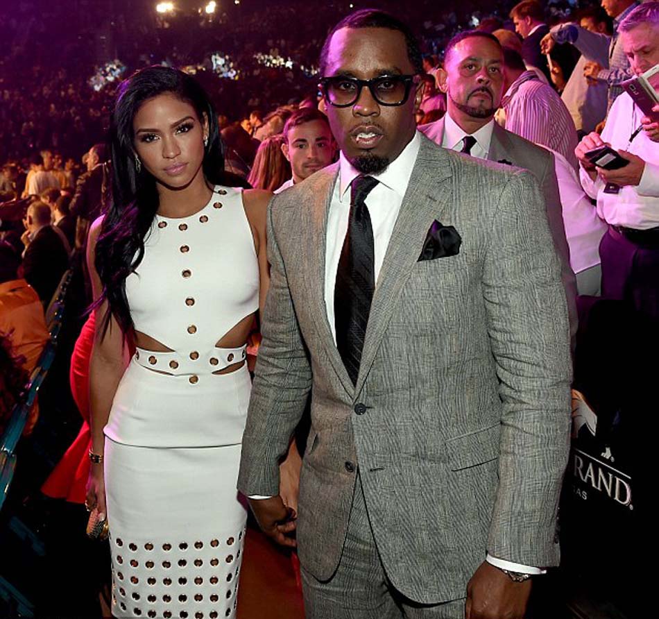 2842376400000578-3065913-Fight_night_Model_Cassie_Ventura_left_and_P_Diddy_pose_ringside_-m-71_1430642104068