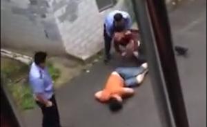 7分钟视频曝光湖南两名开警车者殴打市民过程，两巡防员被拘