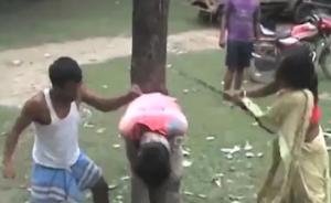印度妇女遭猥亵报警警察不作为，怒将嫌犯绑树上抽打