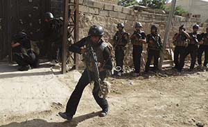 武装分子攻击伊拉克押运犯人，官方称共69人死亡