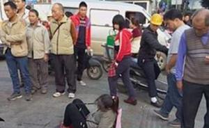 广西南宁一女子因偷肉被捆绑示众，警方称公开侮辱一事也在查
