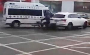 哈尔滨一SUV阻拦救护车近两分钟：救护车退让后它仍在纠缠