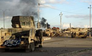 IS在伊美军基地附近自杀式袭击，15名安全部队士兵已死亡