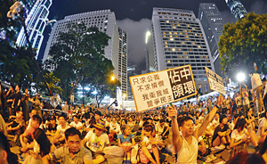香港金管局前总裁：“占中”或令内地对金融中心另做打算