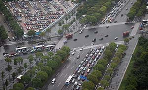 上海2013年新增机动车额度拍卖收入87.9亿元，使用74亿