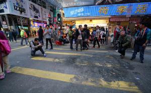 香港警方再拘捕2名涉嫌参加旺角暴乱的男子，目前已拘77人