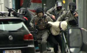 直击｜巴黎恐袭嫌犯在比利时被捕，警方行动现场发生爆炸