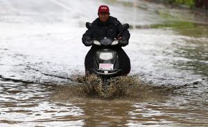 中国南方雨势要到下周一才明显减弱，北方大部仍雨稀少气温高