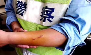 上海交警遇到过的暴力抗法：拖行、撕咬、倒车撞警车