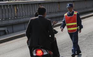 男子在上海骑无牌电动车不认罚，两次打热线恶意投诉民警被拘