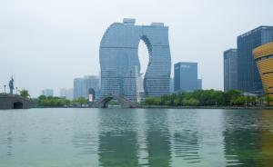 杭州一在建高楼被戏称“粗细腿”，建设方称灵感来自三潭印月