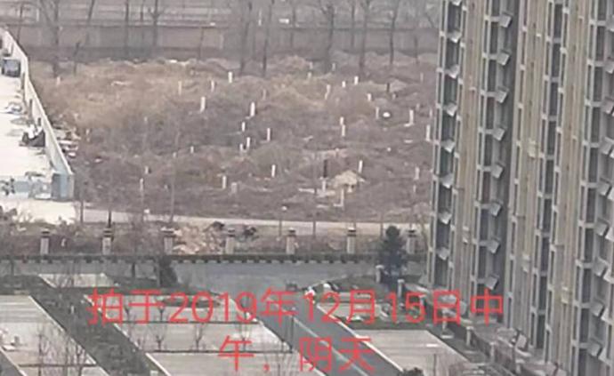 宣传建设休闲区临近交房为墓地，华夏幸福：已注明用地红线