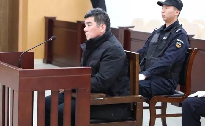 收受玉白菜和鸡血石的安徽厅官桑坤受贿超两千万获刑12年