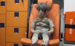 叙利亚男孩照片疑造假：战地摄影如何削弱现实悲剧的反应能力