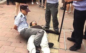 广州一城管协管员劝导地铁口卖唱乞丐被刺伤，警方：乞丐被拘
