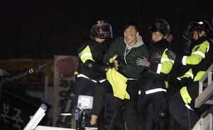 韩国民众凌晨示威与警方发生冲突，23人被捕60人伤