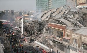 伊朗首都德黑兰商业老楼失火后倒塌，至少20名消防员丧生