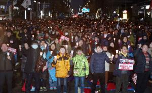 韩国民众严寒中举行第13次集会要求朴槿惠辞职