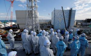 装有相机的探查管伸入拍摄：日本再查福岛核电站堆芯熔化情况