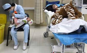 武汉一年轻妈妈医院晕倒，年轻护士接过大哭孩子换尿布
