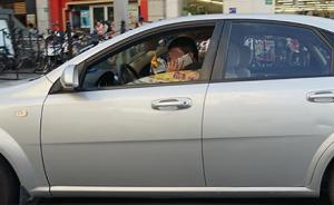 上海警方解读“新条例”：司机等红灯时看手机也要受处罚