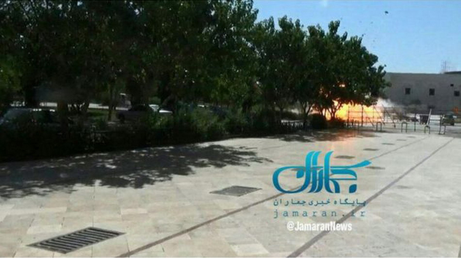 This image, posted by Fars News, shows an explosion taking place outside the mausoleum