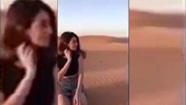 挑战传统？沙特女孩穿短裙游玩引争议
