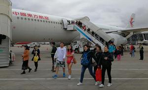 4架东航班机接千余名滞留巴厘岛旅客回国，中午还将增派一架