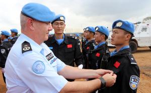 联合国授予中国第五支驻利比里亚维和警察防暴队队员和平勋章