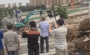 杭州三墩发生路面塌方：挖掘机、信号灯纷纷坠落，幸无人伤