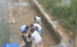 男子酒后骑车坠河，家属请民警将其拘留