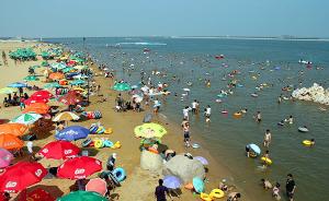 受台风“安比”影响，上海金山城市沙滩明起闭园三天